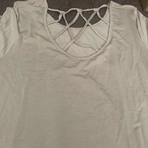 Solid tunic with cross strap back